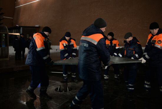 Checking burner of Eternal Flame before Defender of Fatherland Day