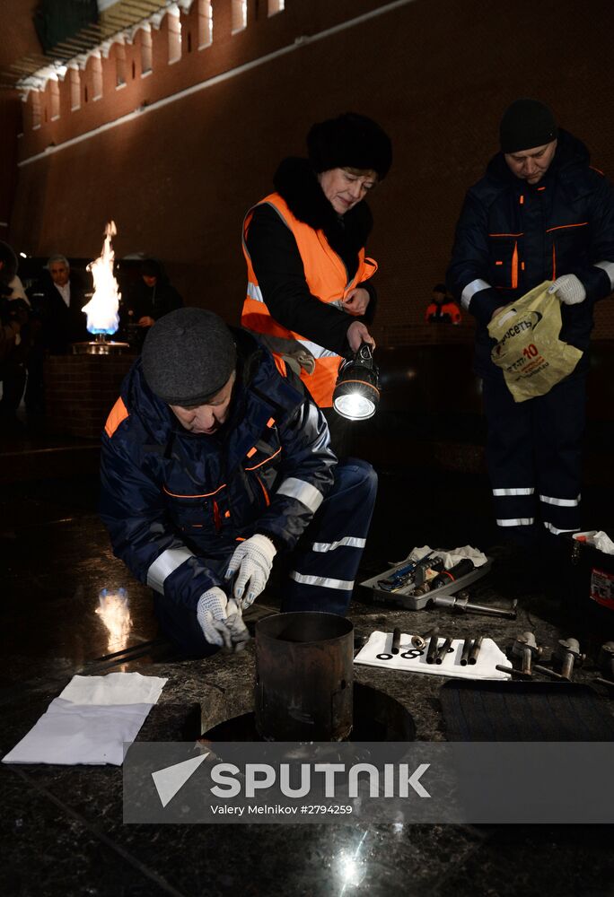 Checking burner of Eternal Flame before Defender of Fatherland Day