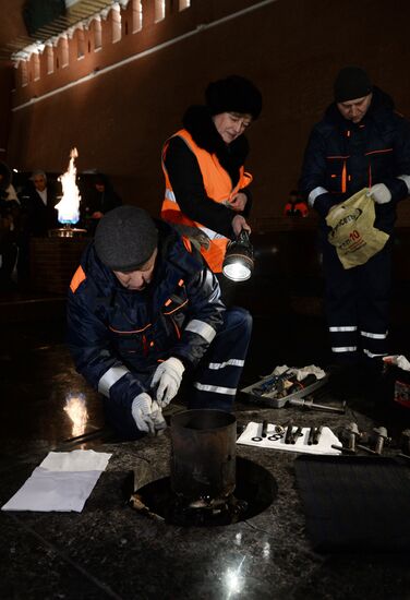 Checking burner of Eternal Flame before Defender of Fatherland Day