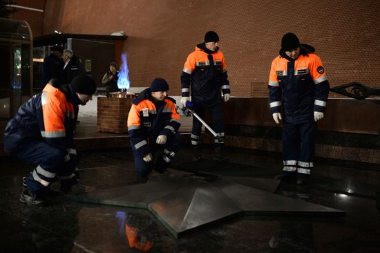 Checking burner of Eternal Flame before Defender of Fatherland Day