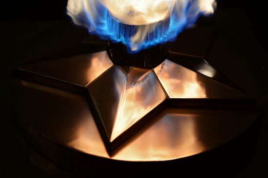 Checking burner of Eternal Flame before Defender of Fatherland Day