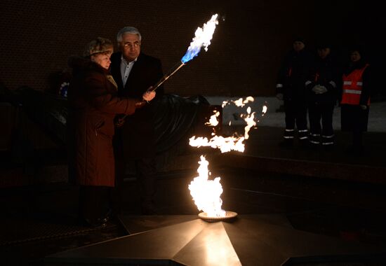 Checking burner of Eternal Flame before Defender of Fatherland Day