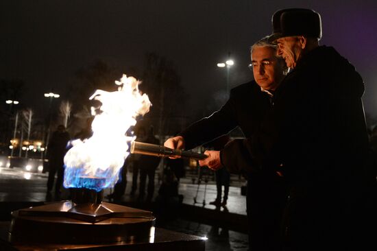 Checking burner of Eternal Flame before Defender of Fatherland Day