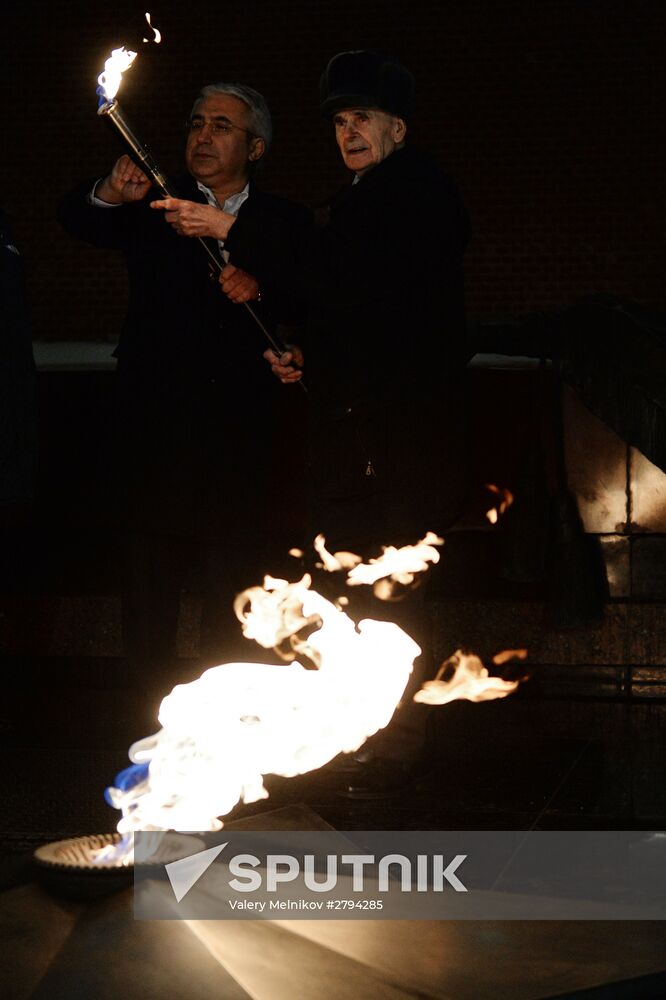 Checking burner of Eternal Flame before Defender of Fatherland Day