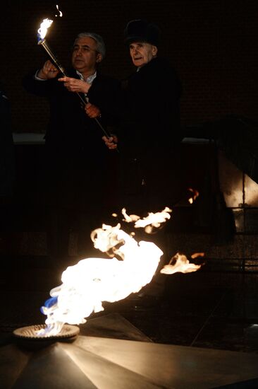 Checking burner of Eternal Flame before Defender of Fatherland Day