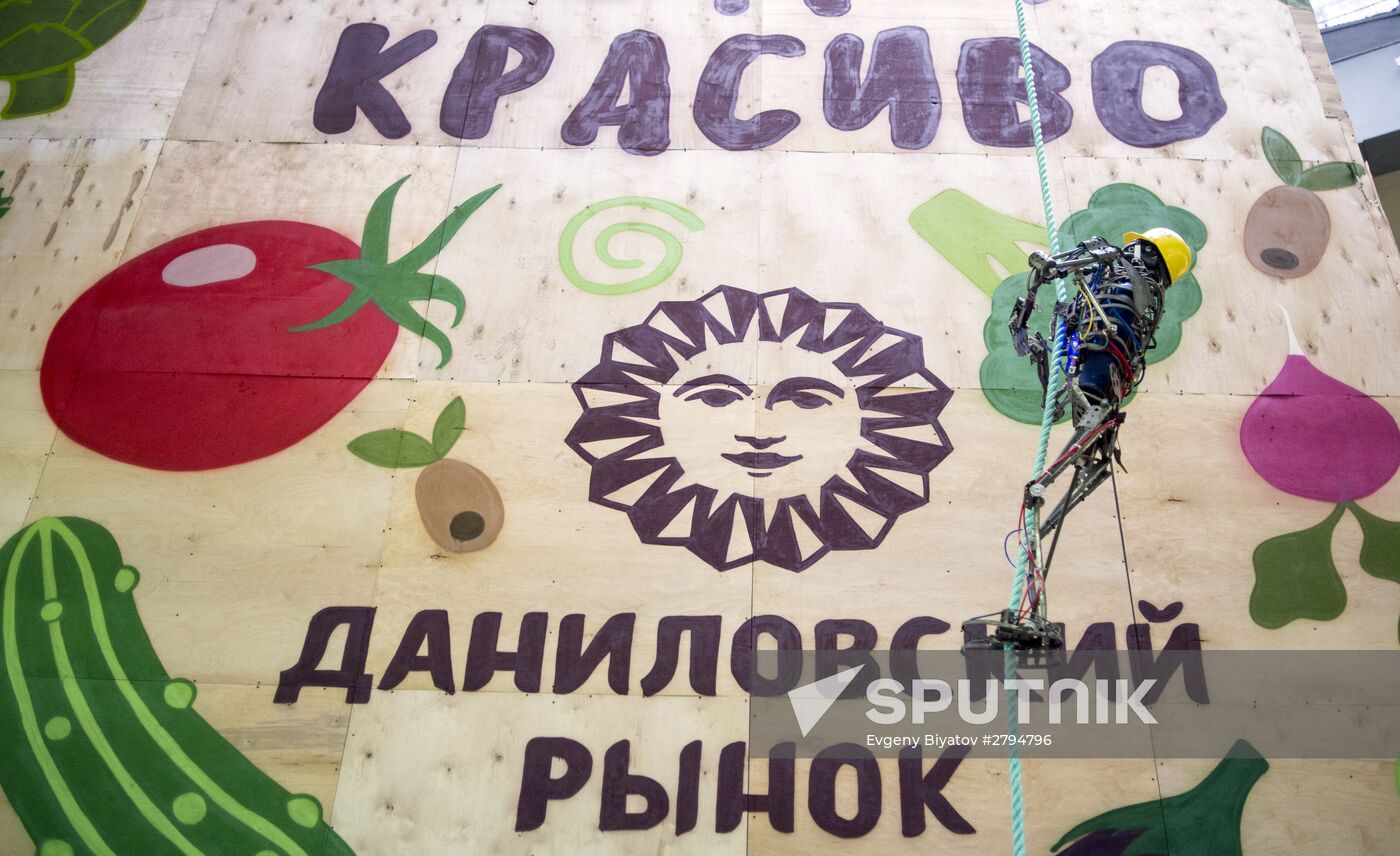 Rope climbing robot Skelly seen inside Danilovsky Market