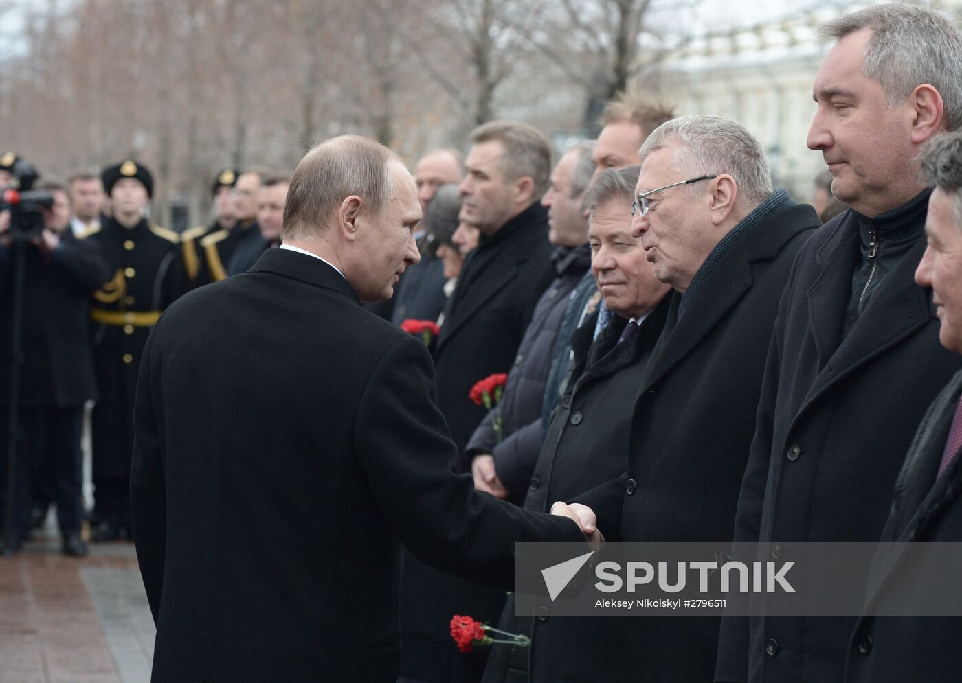 February 23, 2016. President Vladimir Putin, left, during the wreath-laying ceremony at the Tomb of the Unknown Soldier on the Defender of the Fatherland Day. From right: Deputy Prime Minister Dmitry Rogozin and leader of the Liberal-Democratic Party of Russia Vladimir Zhirinovsky. Location: Russia, Moscow. Author: Aleksey Nikolskyi/Sputnik. Wreath-laying ceremony at Tomb of Unknown Soldier on Defender of the Fatherland Day