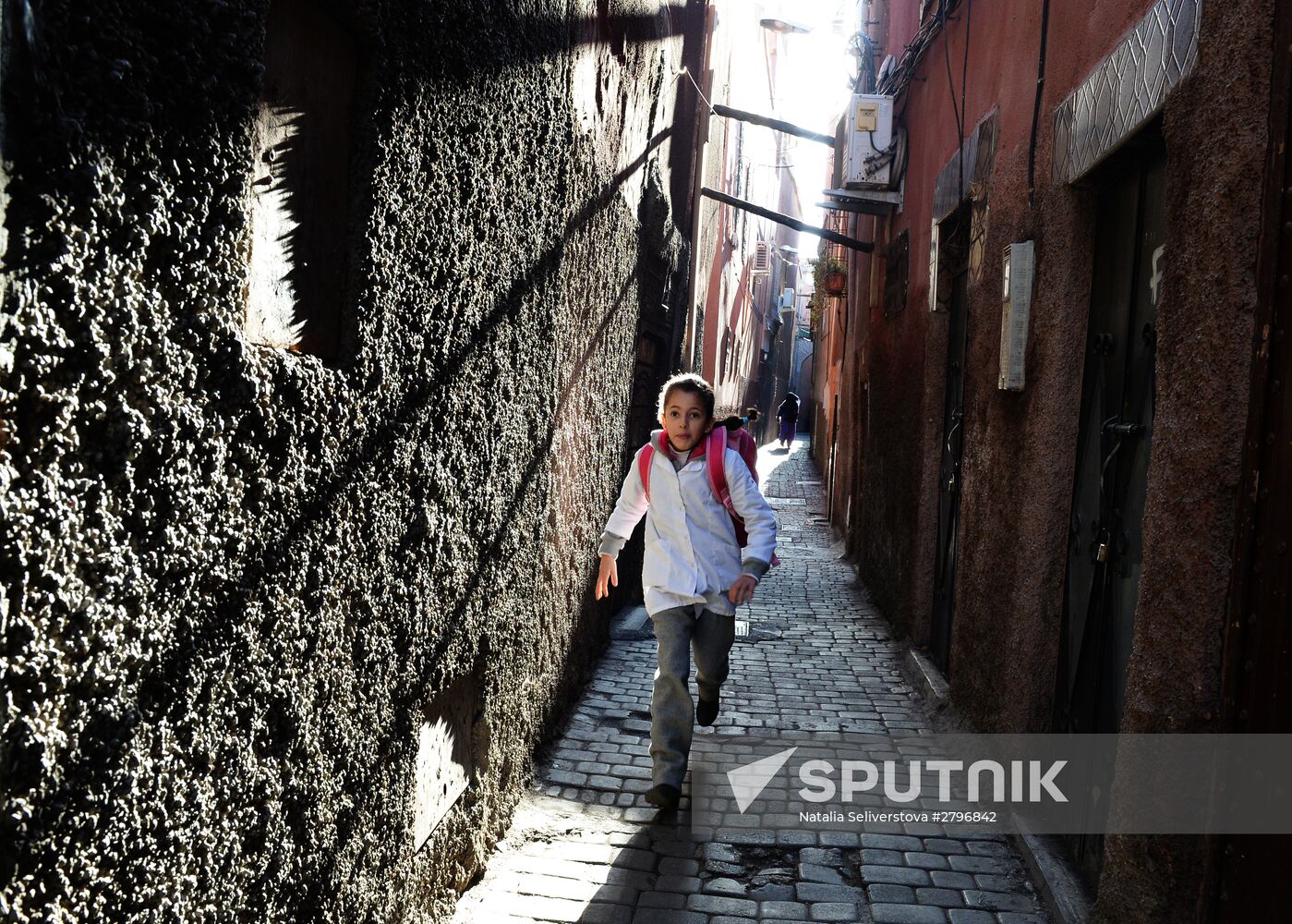 A schoolgirl walks in the medina quarter (old city) of Marrakesh. Location: Morocco. Author: Natalia Seliverstova/Sputnik. Marrakesh's medina quarter
