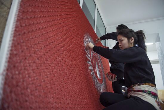Making the national flag of Kyrgyzstan with String Art technique