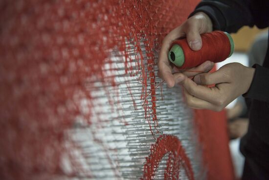 Making the national flag of Kyrgyzstan with String Art technique