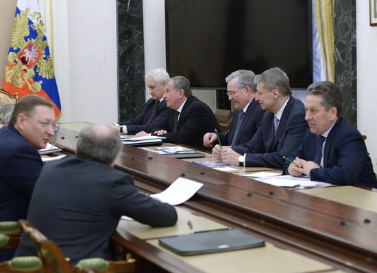 President Vladimir Putin meets with Russian oil suppliers