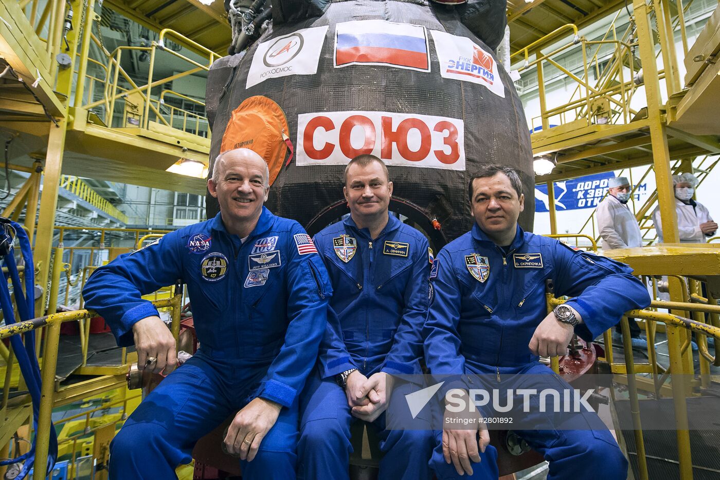 ISS 47/48 prime crew try on space suits, inspect spacecraft