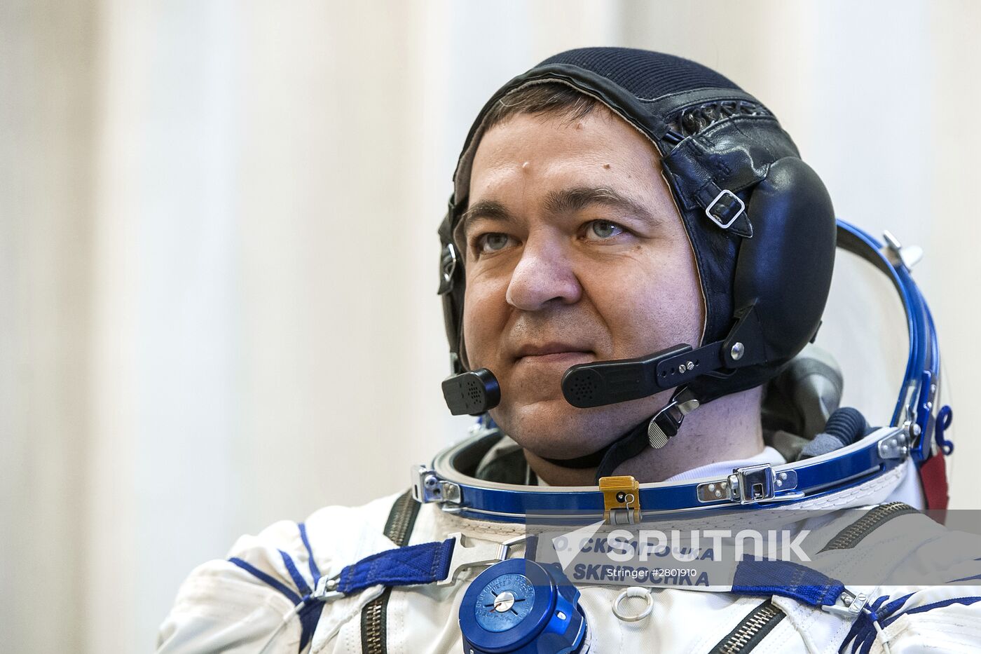 ISS 47/48 prime crew try on space suits, inspect spacecraft