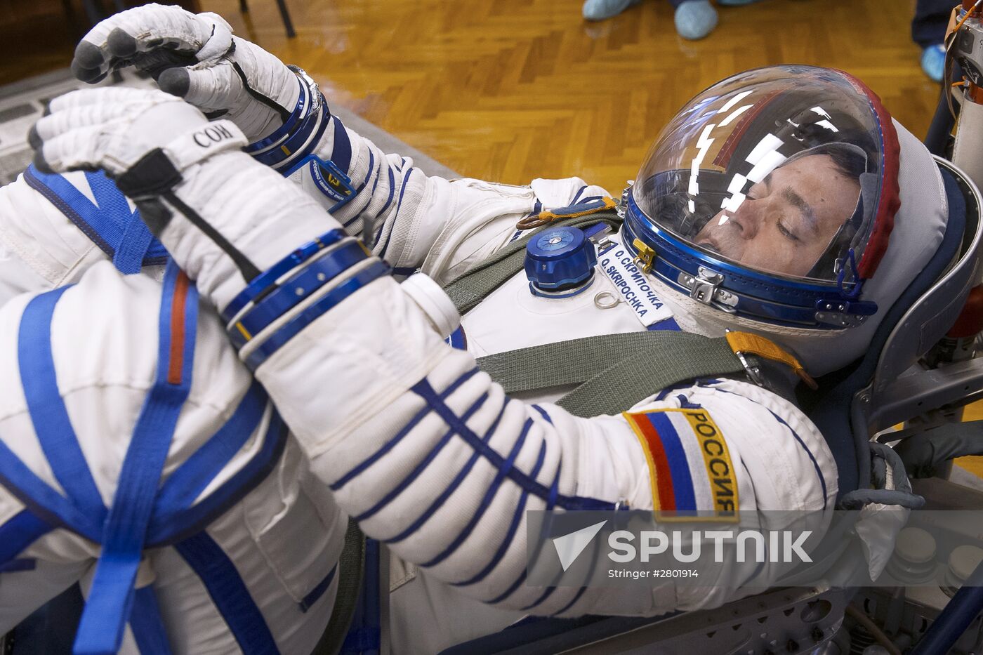 ISS 47/48 prime crew try on space suits, inspect spacecraft