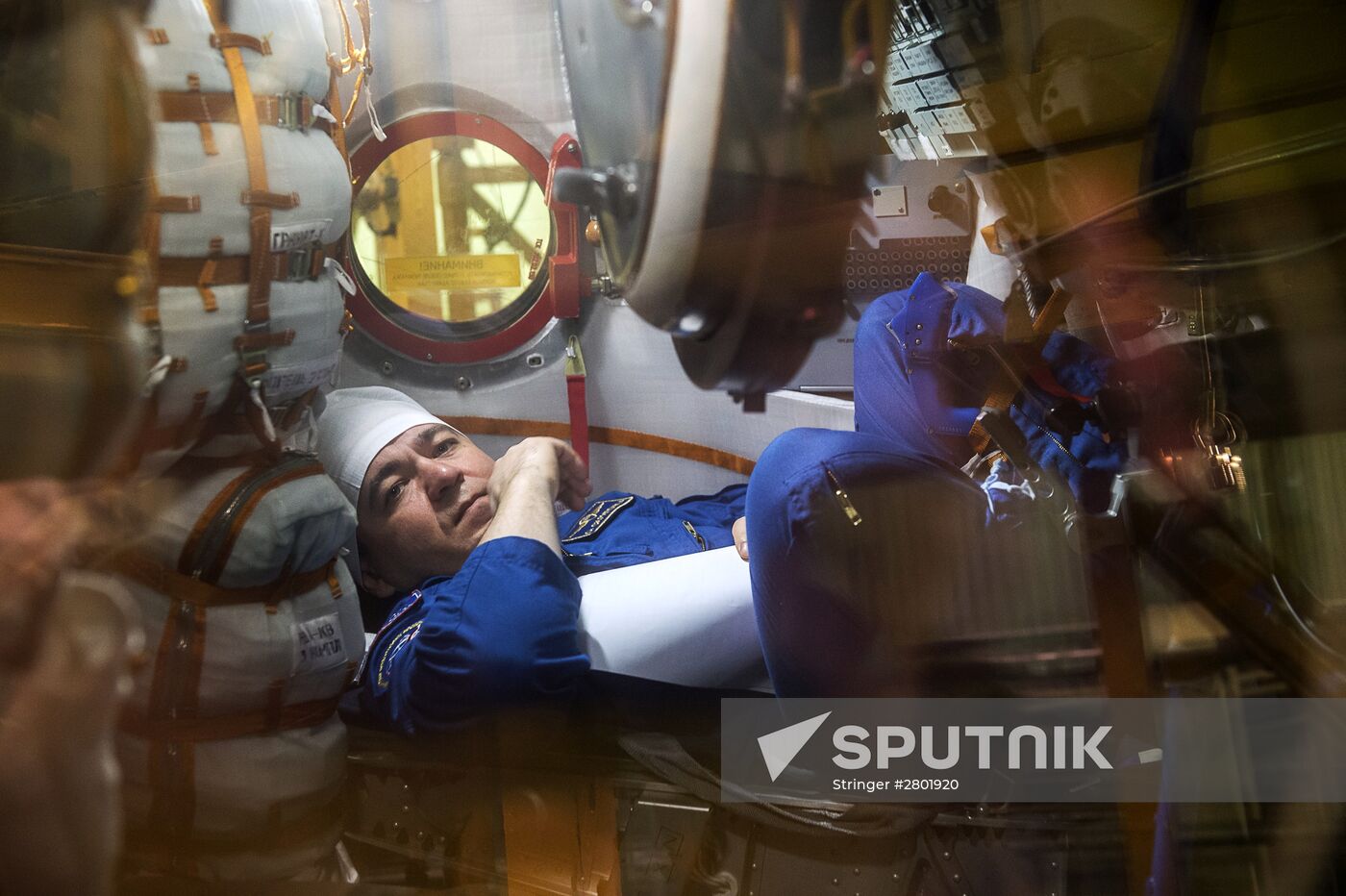 ISS 47/48 prime crew try on space suits, inspect spacecraft