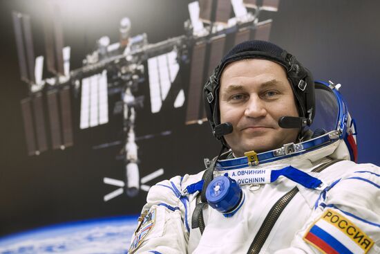 ISS 47/48 prime crew try on space suits, inspect spacecraft