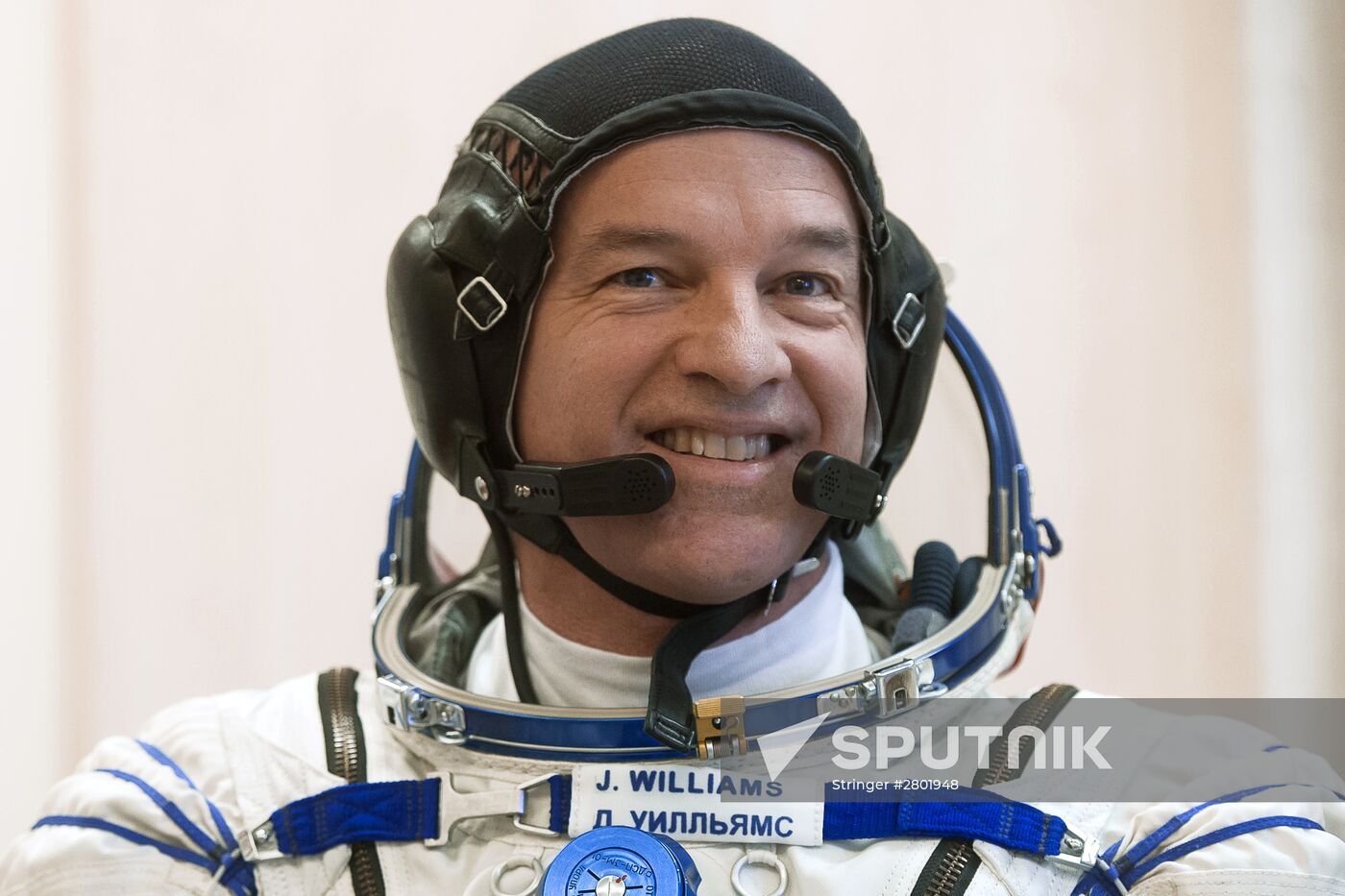 ISS 47/48 prime crew try on space suits, inspect spacecraft