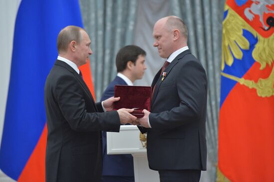 President Vladimir Putin gives government awards in Kremlin