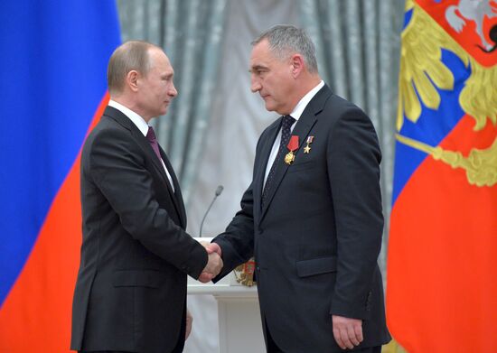 President Vladimir Putin gives government awards in Kremlin