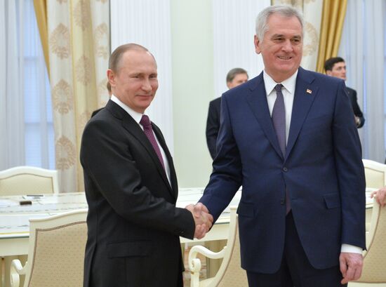 Russian President Vladimir Putin meets with his Serbian Counterpart Tomislav Nikolic
