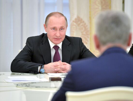 Russian President Vladimir Putin meets with his Serbian Counterpart Tomislav Nikolic