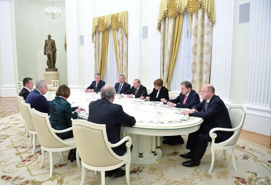 Russian President Vladimir Putin meets with his Serbian Counterpart Tomislav Nikolic