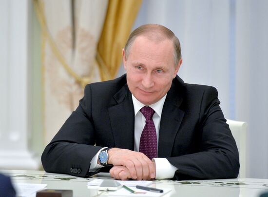 Russian President Vladimir Putin meets with his Serbian Counterpart Tomislav Nikolic