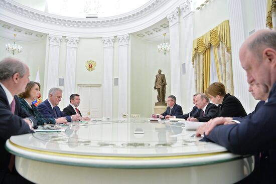 Russian President Vladimir Putin meets with his Serbian Counterpart Tomislav Nikolic