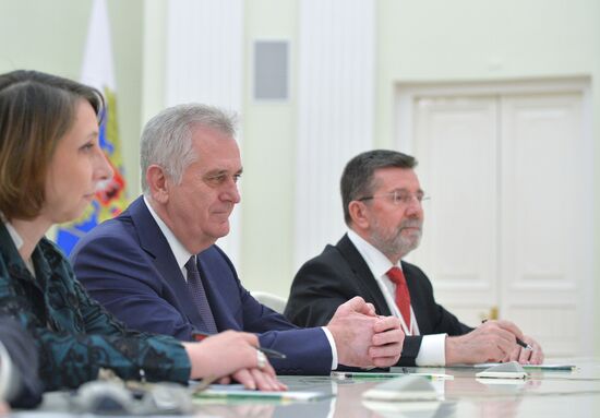 Russian President Vladimir Putin meets with his Serbian Counterpart Tomislav Nikolic