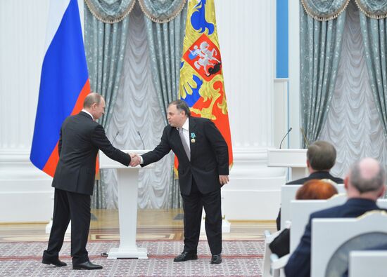 President Vladimir Putin gives government awards in Kremlin