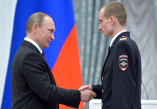 President Vladimir Putin gives government awards in Kremlin