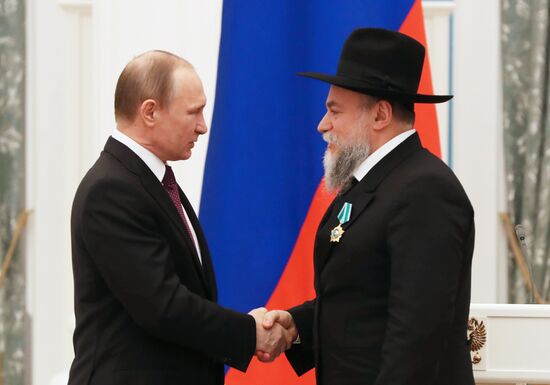 President Vladimir Putin gives government awards in Kremlin