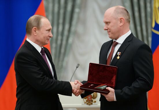 President Vladimir Putin gives government awards in Kremlin
