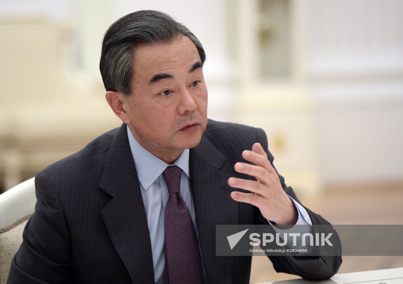 President Vladimir Putin meets with Chinese Foreign Minister Wang Yi