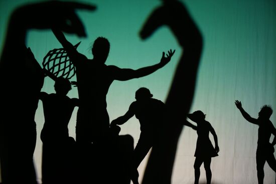 Perfomance of the American shadow circus Pilobolus