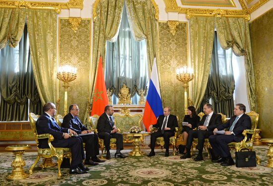 Russian President Vladimir Putin meets with King Mohammed VI of Morocco