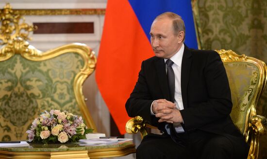 Russian President Vladimir Putin meets with King Mohammed VI of Morocco