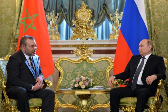 Russian President Vladimir Putin meets with King Mohammed VI of Morocco