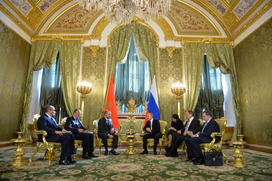Russian President Vladimir Putin meets with King Mohammed VI of Morocco