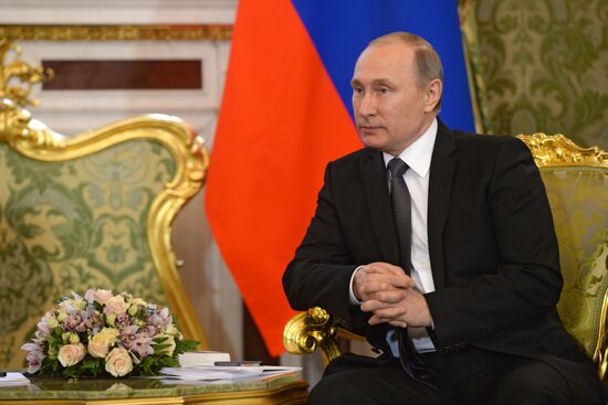 Russian President Vladimir Putin meets with King Mohammed VI of Morocco
