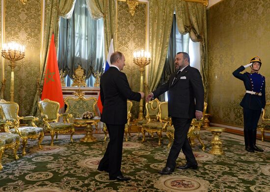 Russian President Vladimir Putin meets with King Mohammed VI of Morocco