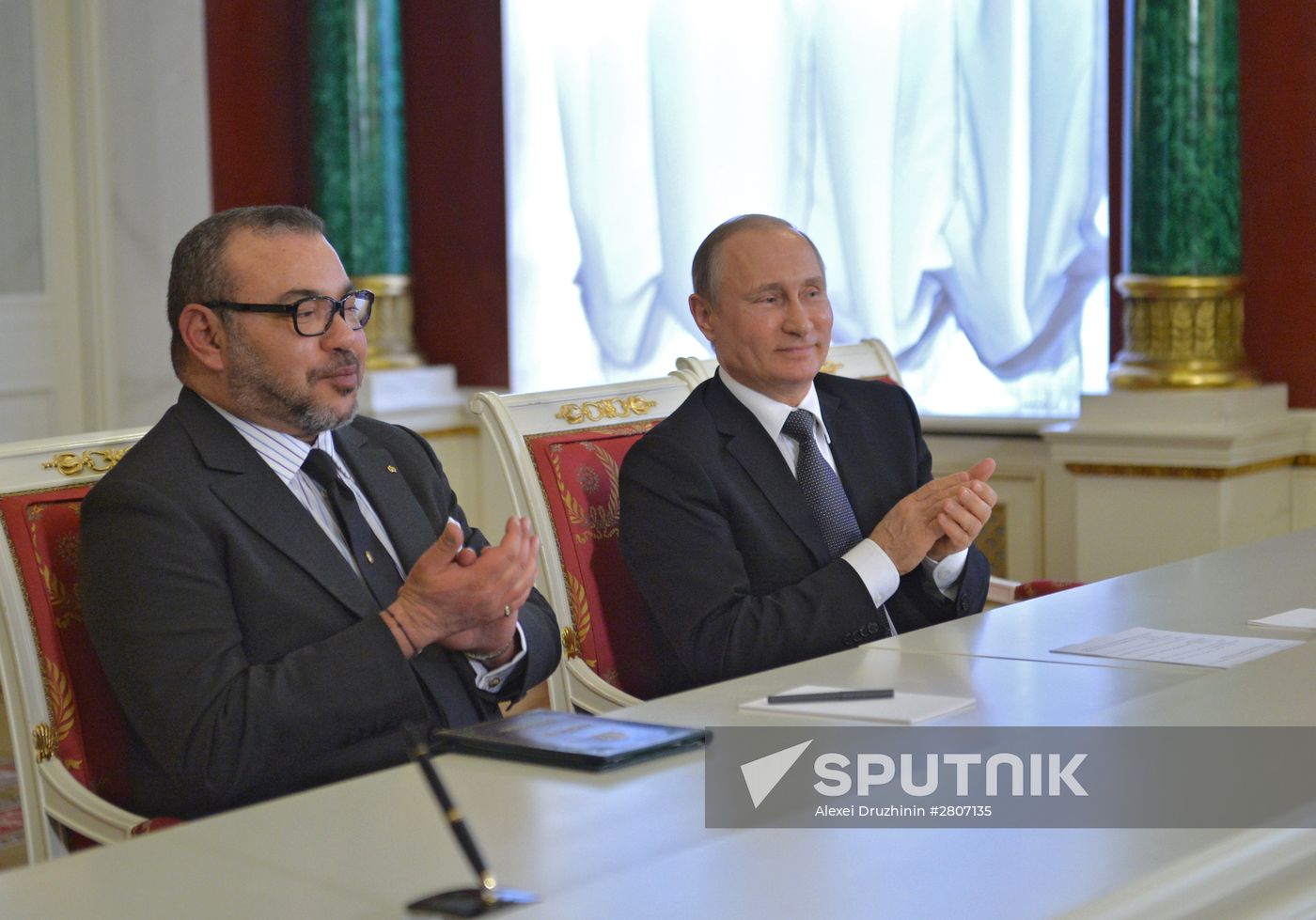 Russian President Vladimir Putin meets with King Mohammed VI of Morocco