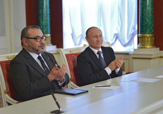 Russian President Vladimir Putin meets with King Mohammed VI of Morocco