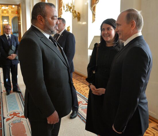 Russian President Vladimir Putin meets with King Mohammed VI of Morocco