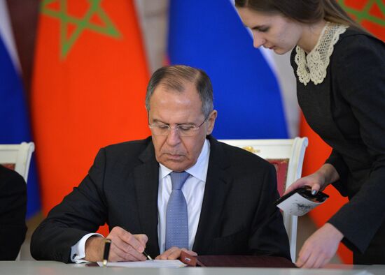 Russian President Vladimir Putin meets with King Mohammed VI of Morocco
