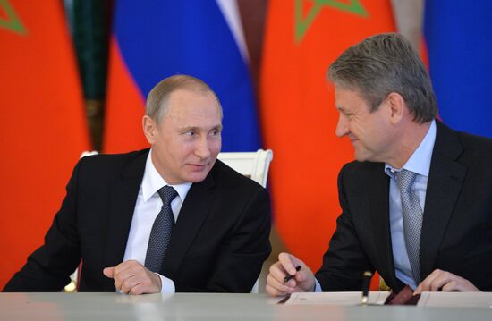 Russian President Vladimir Putin meets with King Mohammed VI of Morocco
