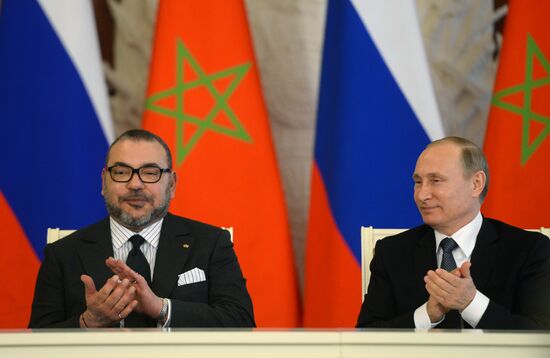 Russian President Vladimir Putin meets with King Mohammed VI of Morocco
