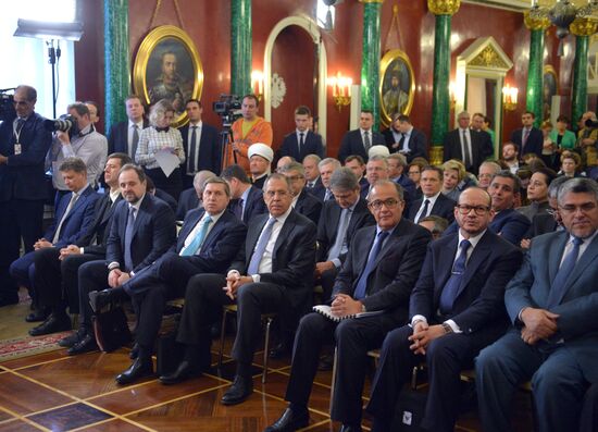 Russian President Vladimir Putin meets with King Mohammed VI of Morocco
