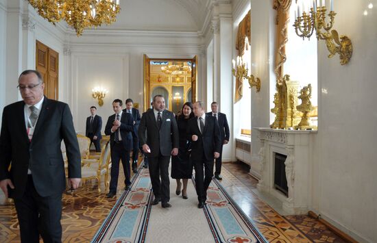 Russian President Vladimir Putin meets with King Mohammed VI of Morocco