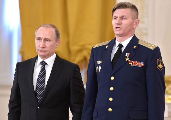 President Vladimir Putin presents state awards to officers who took part in counter-terrorism operation in Syria
